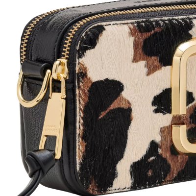 THE COW HAIRCALF SNAPSHOT